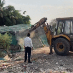 Anti encroachment action during Indore TPS-4 road development project