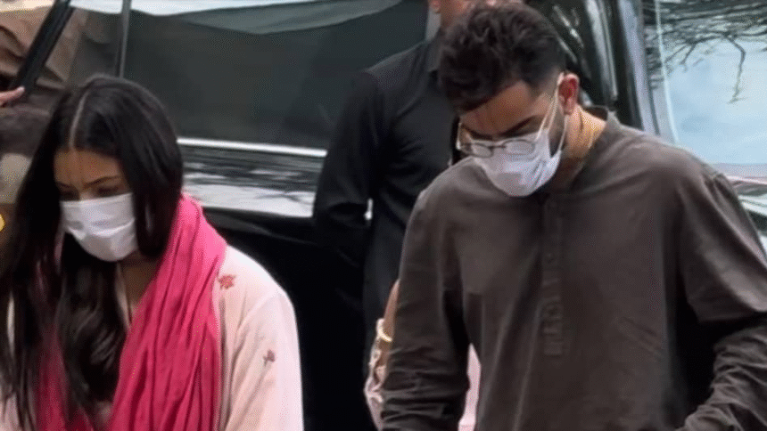 Virat Kohli and Anushka Sharma walking in Vrindavan near Keli Kunj Ashram with devotional atmosphere, temple architecture and spiritual surroundings.