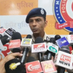 Police Commissioner Santosh Kumar Singh with Indore city map highlighting Lasudia, Banganga-Super Corridor and Dhar Road proposed police station zones.